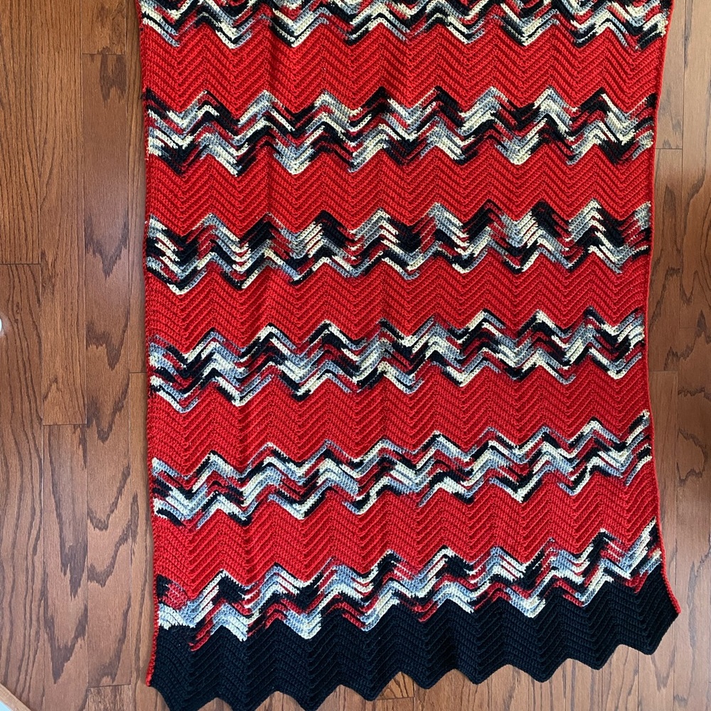 Beautifully handmade afghan. Buckeye colors.